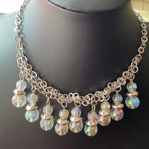 Necklace, earrings and bracelet.